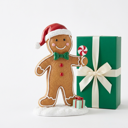 Gingerbread man ornament and plain emerald ivory-ribbon gift box isolated on white